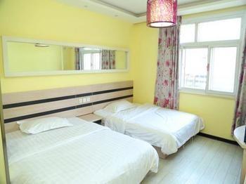 Qingdao Aisen Apartment Hotel Екстериор снимка